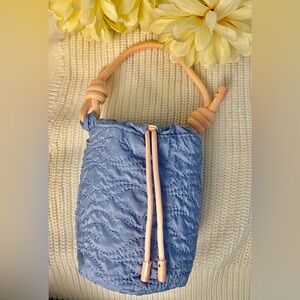 Dolce & Gabbana blue mini bag from fragrance collection.